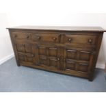 Brights of Nettlebed country oak sideboard with three frieze drawers over three panelled doors to