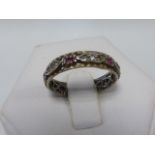 9ct gold Ruby and white gemstone full eternity band, size P/Q.