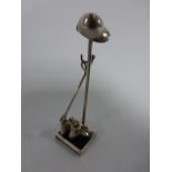 Silver novelty equestrian themed stand with silver boots, crop and hat, 6.5cms in height.