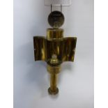 A brass travelling candle holder, 13.5cms in length when closed.