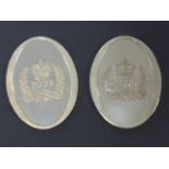 Two silver 1977 Queen Elizabeth Silver Jubilee plaques, measuring 5.2x4cms, 86.4g total.