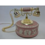 A scarce Wedgwood pale pink jasperware press dial telephone,