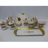 Tea wares decorated with images of Harry Wheatcroft Roses comprising of a sandwich/cake plate,