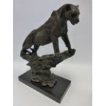 Cast Bronze after Bugatti - standing Panther on a rock, set on marble base, 38cm high.