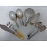 Silver backed four piece mirror and brush set, hallmarked London 1942,