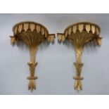 Pair of giltwood wall brackets, 33cms in height.