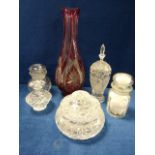 Tall ruby flash cut glass vase, 35cms in height, and a selection of dressing table bottles and jars.