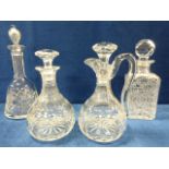 Four quality crystal decanters, unmarked, and a pair of Waterford Crystal 'Ashling'