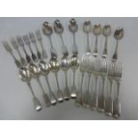 Quantity of Georgian and Victorian silver flatware - 7 serving spoons, 6 dinner forks,