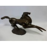 Cast Bronze after Milo of a large stylised rearing horse, approx 75cm long, 33cm high.