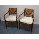 Pair of Sheraton revival open armchairs with painted floral decoration,