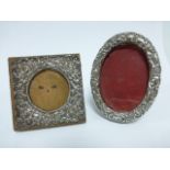 Two miniature silver photograph frames hallmarked Birmingham 1910 and 1924, 6x6cms and 5.7x7.7cms.