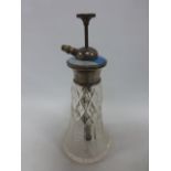 Sterling silver and guilloche enamel topped cut glass atomiser, 16cms in height.