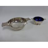 Silver Quaich with twin handles of stylized mythical beasts,