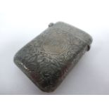 Late Victorian silver vesta case hallmarked London 1895, with engraved foliate decoration, 38g.