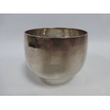 Hammered silver footed bowl hallmarked Sheffield 1960, makers initials N over A S, 8cms in diameter,