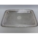 Silver tray of rectangular form with engine turned decoration,