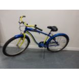 Corona Extra beach cruiser bike in blue & yellow.