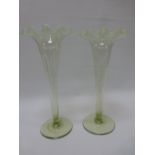 Pair of Vaseline glass trumpet vases with pearline ruffled rim, with circular bases, 27.