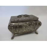 Dutch silver bombe shaped casket embossed with figures at various pursuits scenes,