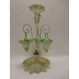 Victorian Vaseline glass epergne with central trumpet and three branches with baskets 56cm high.