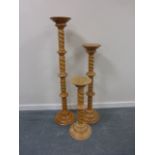 Graduated set of three pine spiral pedestal stands, the largest 125.