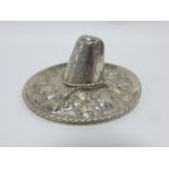 Silver novelty Mexican Sombrero with embossed leaves and rope border, 7cms in diameter, 20g.