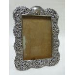 Late Victorian embossed silver photograph frame hallmarked Birmingham 1899 by makers Docker & Burn
