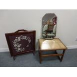 Mahogany framed fire screen with embroidered floral panel under glass,