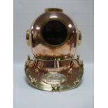 Copper & brass replica of a U S Navy diving helmet Mark V, approximately 39cm high.