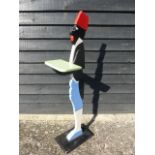 Painted wooden dumb waiter, 95cms in height.