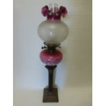 Victorian oil lamp raised on Corinthian column to square base, 76cm high,