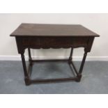 Early 19thC Oak side table with single frieze drawer and shaped apron,