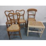 Four (3+1) cane seated chairs together with a painted cane seated stool.