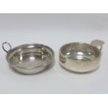 Two silver wine tasters, one hallmarked Birmingham 1929 by makers Burtons & Waters,