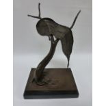 Cast Bronze contemporary stylized forked tree holding a clock, raised on rectangular marbled base,