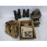 Two pairs of military binoculars one pair French & one other plus a respirator(1939) in cloth bag