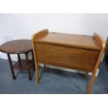 A 1960's sewing box together with a small table.