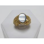 9ct gold signet ring set with with an oval jet stone, size O/P, 3g.