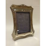 Hammered silver photograph frame hallmarked Birmingham 1906 by makers Deakin & Francis Ltd, 16.