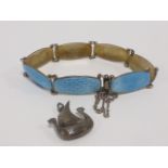 Norwegian silver and enamel panelled bracelet together with a silver Viking ship charm.