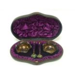 Victorian cased set of two silver salts with spoons,