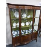 Edwardian serpentine fronted mahogany and satinwood inlaid display cabinet,