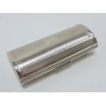 Silver Kigu vanity case with engine turned decoration, hallmarked London 1963, 9cms in length, 69.