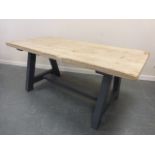 Bespoke kitchen table with bleached four planked top and grey painted base supports, 183x84x76cms.