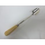 A George III silver shell backed Stilton cheese scoop with ivory handle,