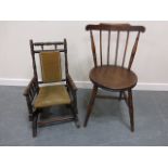 An American child's rocking chair with padded seat and back, on turned spindle supports,