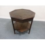 Oak octagonal table with carved top and shaped undertier, 81cms in diameter, 70cms in height.