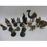 Cast metal nutcracker in the form of a squirrel, three brass elephants & a camel,