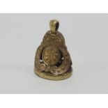 Yellow metal fob with intaglio seal 'Tou